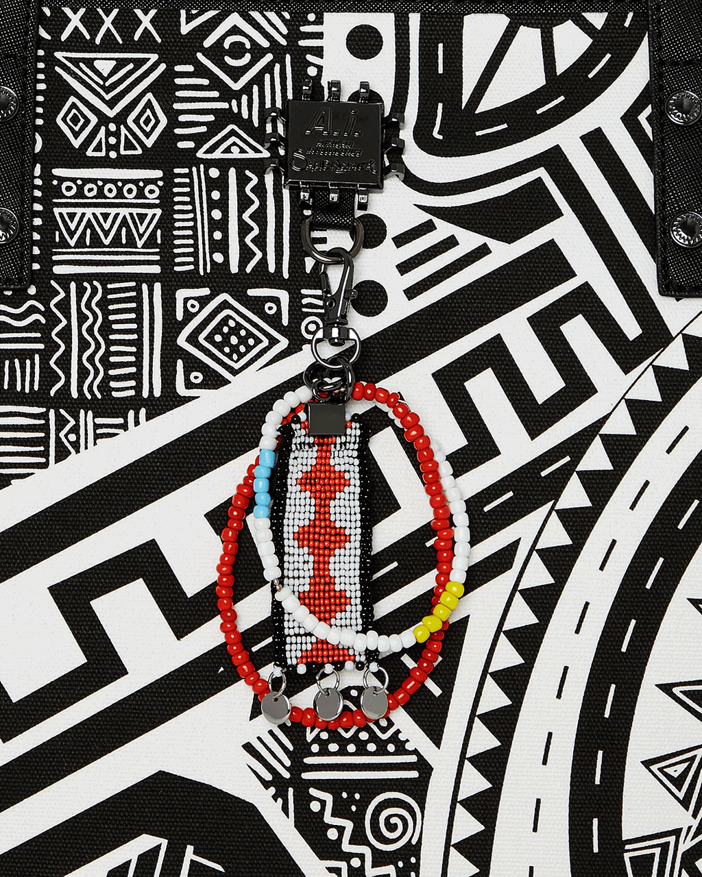 A.I. AFRICAN INTELLIGENCE THE SKYHAWK WING TOTE - SANDFLOWER COLLAB